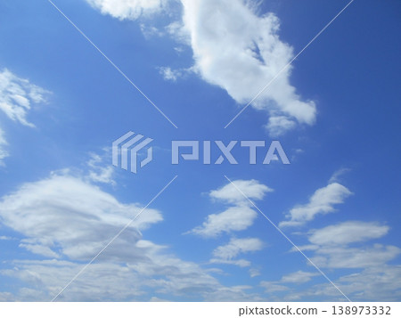 White clouds floating in the blue sky White clouds floating in the blue sky 138973332