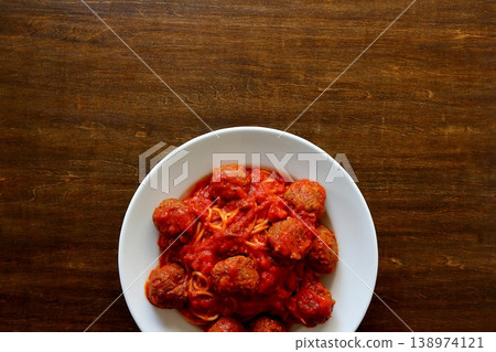 Meatball pasta with a table background viewed from directly above. Meatball pasta with a table background viewed from directly above. 138974121