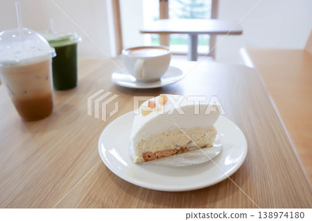 coconut tart or coconut cake or sponge cakeor coconut tart with macadamia and hot coffee 138974180