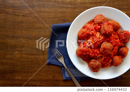 Meatball pasta with a table background viewed from directly above. Meatball pasta with a table background viewed from directly above. 138974432