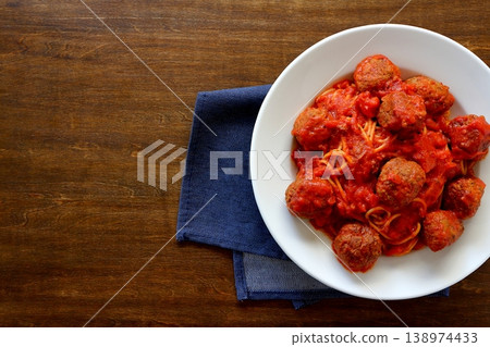 Meatball pasta with a table background viewed from directly above. Meatball pasta with a table background viewed from directly above. 138974433