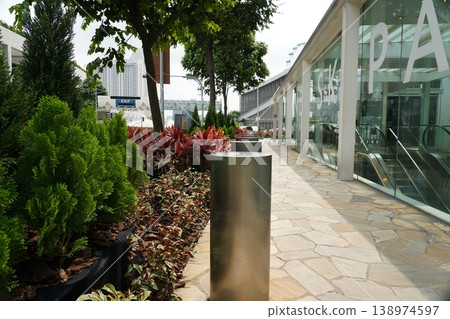Urban landscape with plants and walkway perspective Urban landscape with plants and walkway perspective 138974597