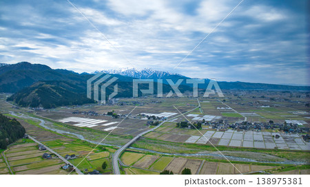 A view of the Kurobe River alluvial fan and the surrounding mountain ranges from Asahi Town, Toyama Prefecture, Japan. A view of the Kurobe River alluvial fan and the surrounding mountain ranges from Asahi Town, Toyama Prefecture, Japan. 138975381