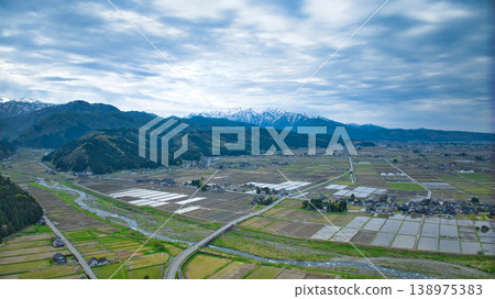 A view of the Kurobe River alluvial fan and the surrounding mountain ranges from Asahi Town, Toyama Prefecture, Japan. 138975383