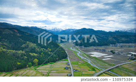 A view of the Kurobe River alluvial fan and the surrounding mountain ranges from Asahi Town, Toyama Prefecture, Japan. 138975384