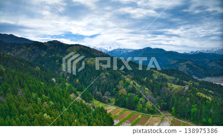 A view of the Kurobe River alluvial fan and the surrounding mountain ranges from Asahi Town, Toyama Prefecture, Japan. A view of the Kurobe River alluvial fan and the surrounding mountain ranges from Asahi Town, Toyama Prefecture, Japan. 138975386
