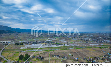 A view of the Kurobe River alluvial fan and the surrounding mountain ranges from Asahi Town, Toyama Prefecture, Japan. A view of the Kurobe River alluvial fan and the surrounding mountain ranges from Asahi Town, Toyama Prefecture, Japan. 138975392