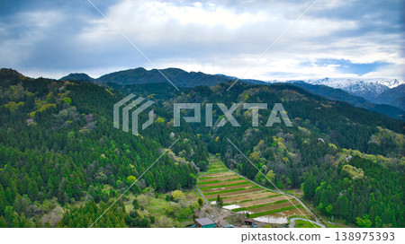 A view of the Kurobe River alluvial fan and the surrounding mountain ranges from Asahi Town, Toyama Prefecture, Japan. A view of the Kurobe River alluvial fan and the surrounding mountain ranges from Asahi Town, Toyama Prefecture, Japan. 138975393
