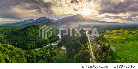 Beautiful morning view in Indonesia, panoramic landscape of rice fields with mountain ranges and clear sky Beautiful morning view in Indonesia, panoramic landscape of rice fields with mountain ranges and clear sky 138975510