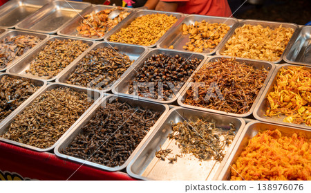 Exotic Thai Street Food Deep-Fried Insects at a Local Night Market Exotic Thai Street Food Deep-Fried Insects at a Local Night Market 138976076