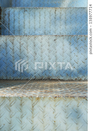 Blue Metal stair with weathered grunge and oval emboss texture Blue Metal stair with weathered grunge and oval emboss texture 138977714