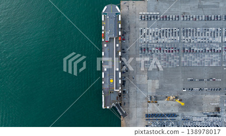 Aerial view cargo vehicles car carrier at import export cars terminal seaport, Vehicle car carrier vessel loading cars for shipping to worldwide, Automotive industry distribution logistic transport Aerial view cargo vehicles car carrier at import export cars terminal seaport, Vehicle car carrier vessel loading cars for shipping to worldwide, Automotive industry distribution logistic transport 138978017