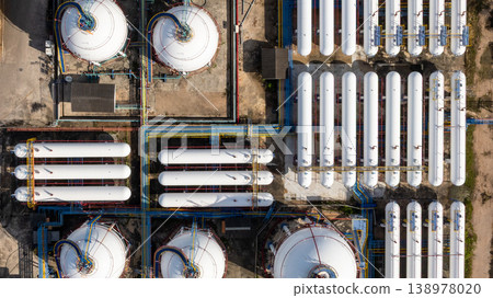 Aerial view gas storage sphere tank natural gas storage tank, Liquefied natural gas storage tank, Industrial refinery and storage tanks. Aerial view gas storage sphere tank natural gas storage tank, Liquefied natural gas storage tank, Industrial refinery and storage tanks. 138978020