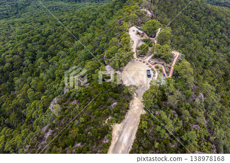 Aerial view over Hargraves Lookout in the Blue Mountains, New South Wales, Australia. The scenic landscape shows dramatic sandstone cliffs, deep valleys and forest covered wilderness Aerial view over Hargraves Lookout in the Blue Mountains, New South Wales, Australia. The scenic landscape shows dramatic sandstone cliffs, deep valleys and forest covered wilderness 138978168
