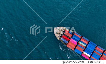 Aerial view container cargo ship carrier container on sea, Global business logistics transportation by container cargo ship, Container cargo ship freight shipping import export supply chain. Aerial view container cargo ship carrier container on sea, Global business logistics transportation by container cargo ship, Container cargo ship freight shipping import export supply chain. 138978313