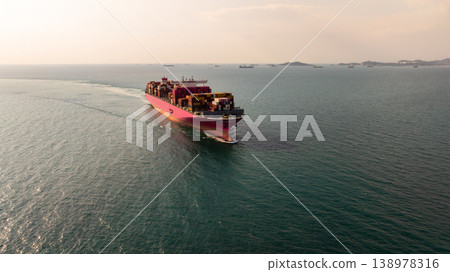 Aerial view container cargo ship carrier container on sea, Global business logistics transportation by container cargo ship, Container cargo ship freight shipping import export supply chain. Aerial view container cargo ship carrier container on sea, Global business logistics transportation by container cargo ship, Container cargo ship freight shipping import export supply chain. 138978316