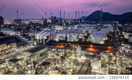 Aerial view Oil and Gas refinery plant at night, Global business energy logistic transportation, Oil and gas refinery petrochemical industrial, Petrochemical refinery industrial energy supply chain. 138978318