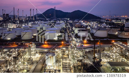 Aerial view Oil and Gas refinery plant at night, Global business energy logistic transportation, Oil and gas refinery petrochemical industrial, Petrochemical refinery industrial energy supply chain. 138978319