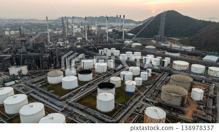 Aerial view oil and gas refinery petrochemical storage tank and pipeline steel, Oil and gas transportation system pipeline steel at oil and gas refinery industry chemical plant, Pipeline oil and gas. Aerial view oil and gas refinery petrochemical storage tank and pipeline steel, Oil and gas transportation system pipeline steel at oil and gas refinery industry chemical plant, Pipeline oil and gas. 138978337