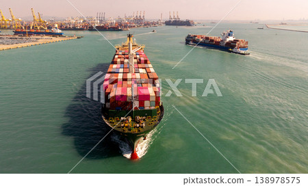 Aerial view container ship carrier container on the sea, Global business logistics and Global trade transportation, Container ship freight shipping import export logistics supply chain. Aerial view container ship carrier container on the sea, Global business logistics and Global trade transportation, Container ship freight shipping import export logistics supply chain. 138978575