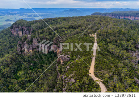 Aerial view over Hargraves Lookout in the Blue Mountains, New South Wales, Australia. The scenic landscape shows dramatic sandstone cliffs, deep valleys and forest covered wilderness 138978611