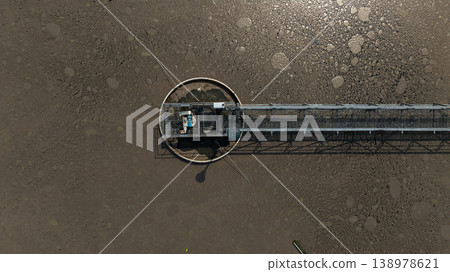 Aerial view wastewater treatment plant. Circular sedimentation tanks biological reactor, Water cleaning facility wastewater treatment plant, Recirculation solid contact clarifier sedimentation tank. Aerial view wastewater treatment plant. Circular sedimentation tanks biological reactor, Water cleaning facility wastewater treatment plant, Recirculation solid contact clarifier sedimentation tank. 138978621