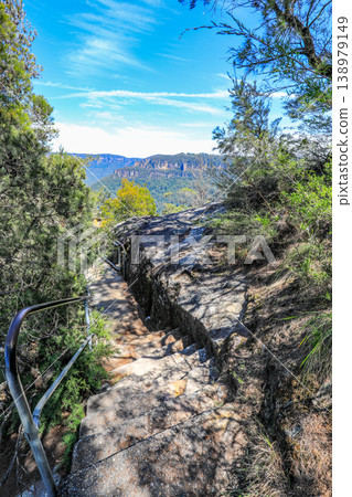 Scenic view of Grose Valley from Sublime Point in the Blue Mountains, New South Wales, Australia. The landscape features dramatic sandstone cliffs, deep forested valley Scenic view of Grose Valley from Sublime Point in the Blue Mountains, New South Wales, Australia. The landscape features dramatic sandstone cliffs, deep forested valley 138979149