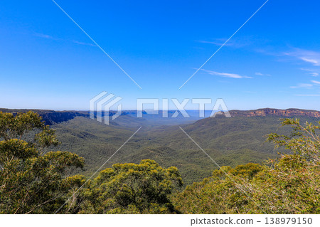 Scenic view of Grose Valley from Sublime Point in the Blue Mountains, New South Wales, Australia. The landscape features dramatic sandstone cliffs, deep forested valley Scenic view of Grose Valley from Sublime Point in the Blue Mountains, New South Wales, Australia. The landscape features dramatic sandstone cliffs, deep forested valley 138979150
