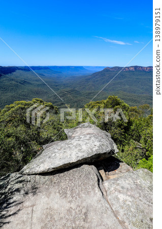 Scenic view of Grose Valley from Sublime Point in the Blue Mountains, New South Wales, Australia. The landscape features dramatic sandstone cliffs, deep forested valley Scenic view of Grose Valley from Sublime Point in the Blue Mountains, New South Wales, Australia. The landscape features dramatic sandstone cliffs, deep forested valley 138979151