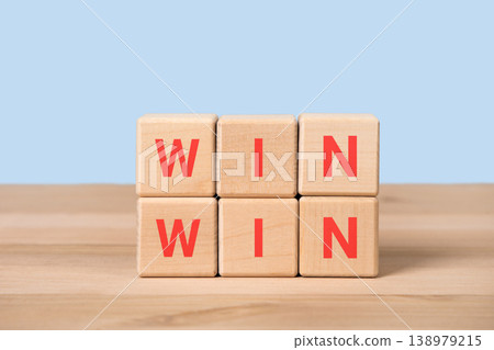 Wooden blocks with word win. Concept of collaboration and partnership leading to success. Strategy and business concept Wooden blocks with word win. Concept of collaboration and partnership leading to success. Strategy and business concept 138979215