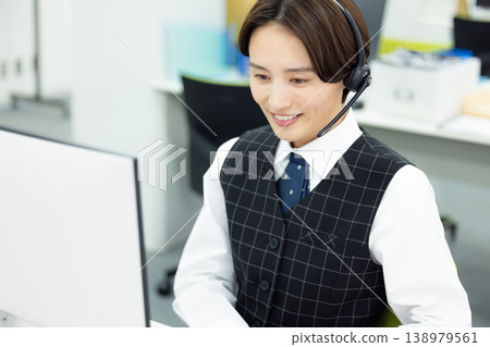 Business woman wearing an intercom 138979561