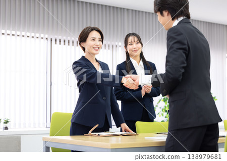 Business negotiation, woman shaking hands. Business negotiation, woman shaking hands. 138979681