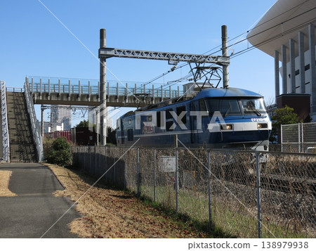 A freight train (EF210-12) on the Tokaido Freight Line (Takashima Line) running alongside Takashima Waterfront Park in Nishi Ward, Yokohama City. A freight train (EF210-12) on the Tokaido Freight Line (Takashima Line) running alongside Takashima Waterfront Park in Nishi Ward, Yokohama City. 138979938