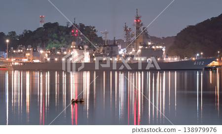 The Japan Maritime Self-Defense Force test ship "Asuka" (ASE-6102) quietly moored at the Yoshikura Pier in Yokosuka at night. 138979976