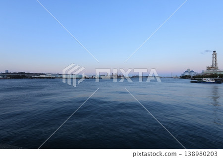 The factories of the Negishi industrial complex bathed in the setting sun - evening view 138980203
