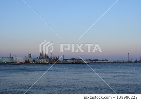 The factories of the Negishi industrial complex bathed in the setting sun - evening view 138980222