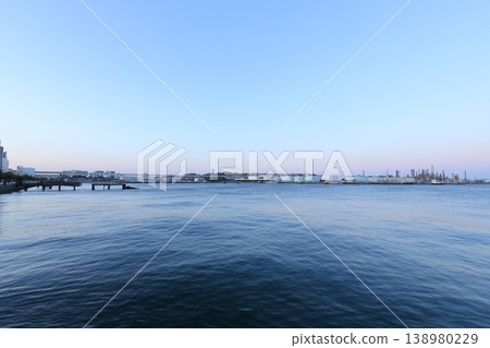 The factories of the Negishi industrial complex bathed in the setting sun - evening view 138980229