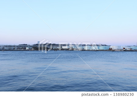 The factories of the Negishi industrial complex bathed in the setting sun - evening view 138980230
