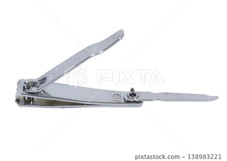 Classic silver stainless steel nail clipper on black background. Classic silver stainless steel nail clipper on black background. 138983221