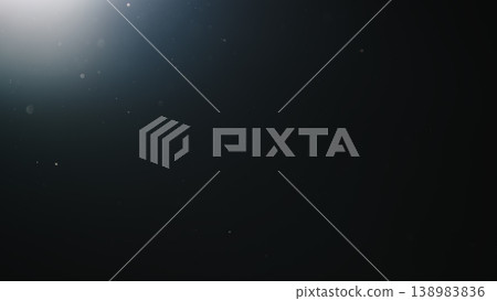 dust particles floating mid air over dark background with some lens flare dust particles floating mid air over dark background with some lens flare 138983836