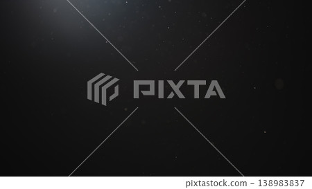 dust particles floating mid air over dark background dust particles floating mid air over dark background 138983837