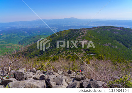 A vast and magnificent mountain landscape viewed from the hiking trail of Mt. Tateshina, one of Japan's 100 Famous Mountains. A vast and magnificent mountain landscape viewed from the hiking trail of Mt. Tateshina, one of Japan's 100 Famous Mountains. 138984104