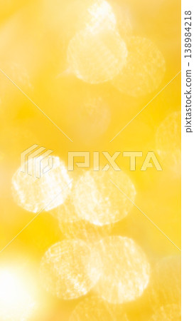 A fluffy yellow bokeh gradient background. A fluffy yellow bokeh gradient background. 138984218