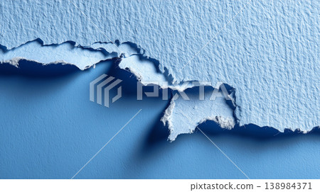 Ripped blue paper with torn edge texture 138984371