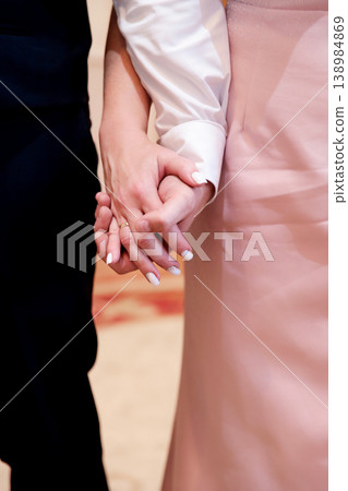 Married Couple's Hands with Elegant Ring and White Polish Married Couple's Hands with Elegant Ring and White Polish 138984869
