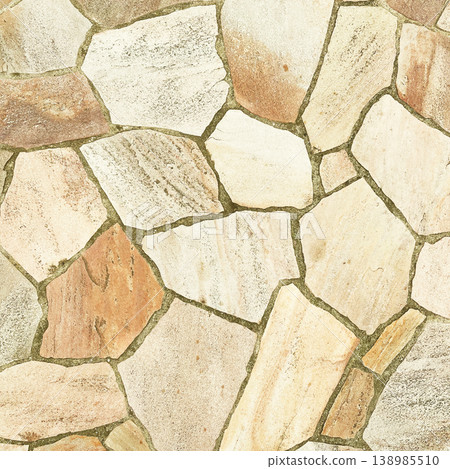 A square background image of the surface of irregularly shaped paving stones in a light ochre color. A square background image of the surface of irregularly shaped paving stones in a light ochre color. 138985510