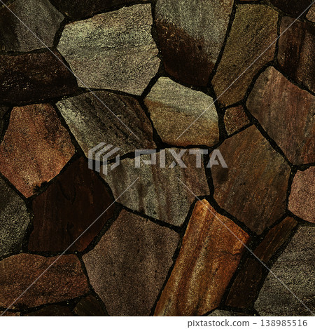 A square background image of the surface of irregularly shaped paving stones in a dark, deep ochre color. 138985516