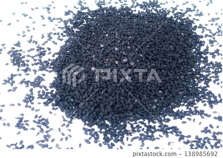 Black cumin seeds pile isolated on white background Black cumin seeds pile isolated on white background 138985692