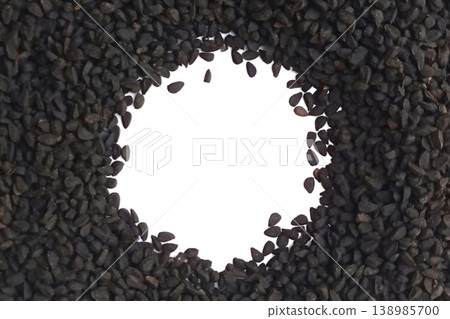 Black cumin seeds pile isolated on white background Black cumin seeds pile isolated on white background 138985700