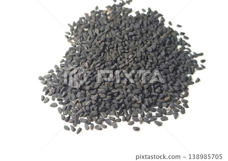 Black cumin seeds pile isolated on white background 138985705